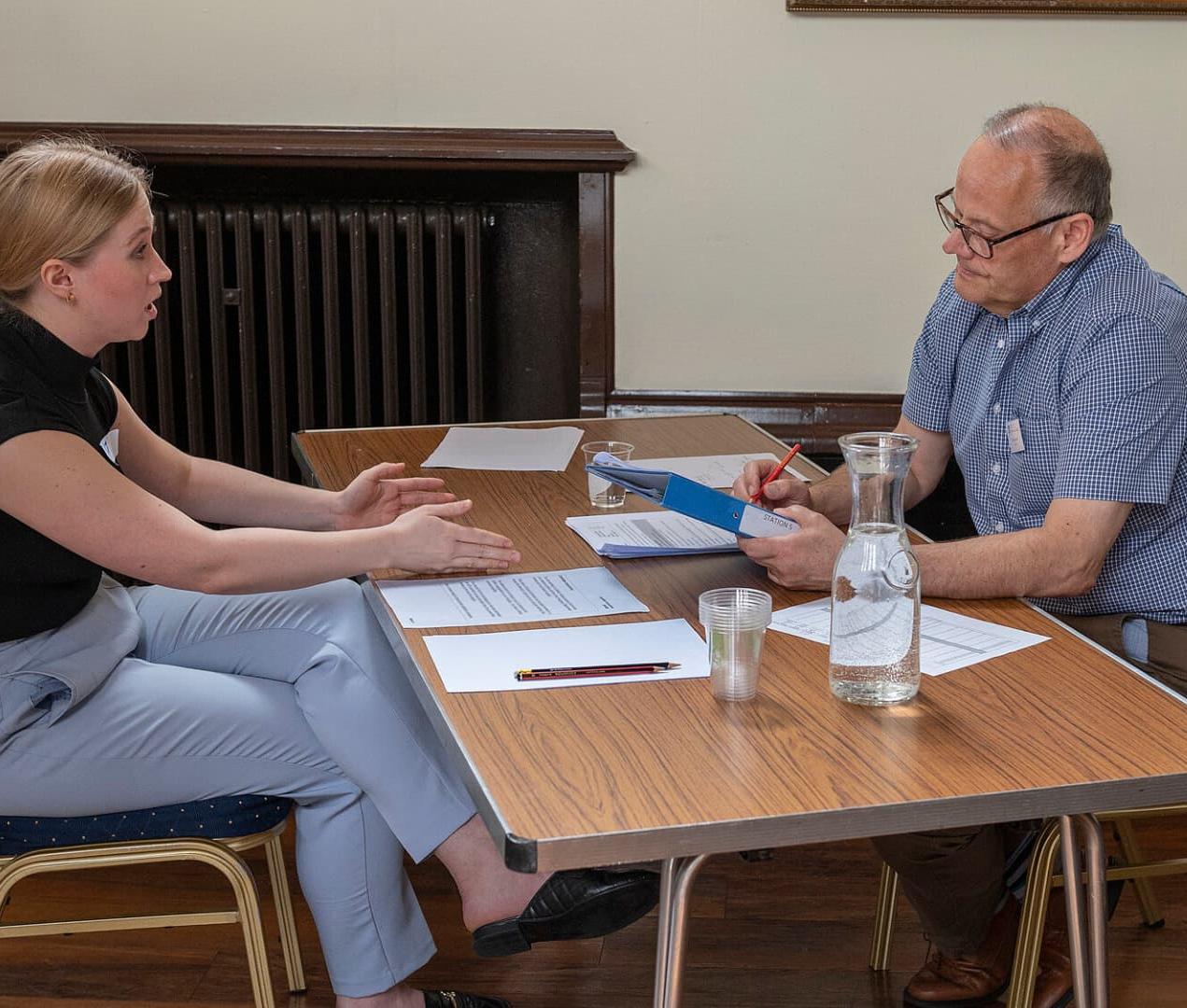 Candidate and examiner at an MRCS OSCE exam